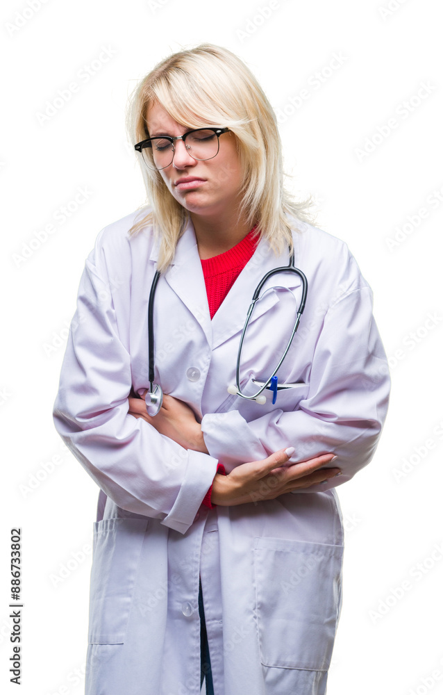 Young beautiful blonde doctor woman wearing medical uniform over isolated background with hand on stomach because nausea, painful disease feeling unwell. Ache concept. Young beautiful blonde doctor woman wearing medical uniform over isolated background with hand on stomach because nausea, painful disease feeling unwell. Ache concept.