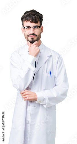 Young professional scientist man wearing white coat over isolated background looking confident at the camera with smile with crossed arms and hand raised on chin. Thinking positive.