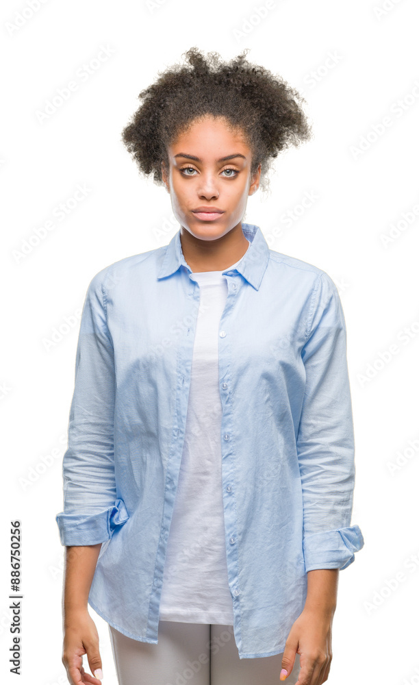 Young afro american woman over isolated background with serious expression on face. Simple and natural looking at the camera. Young afro american woman over isolated background with serious expression on face. Simple and natural looking at the camera.