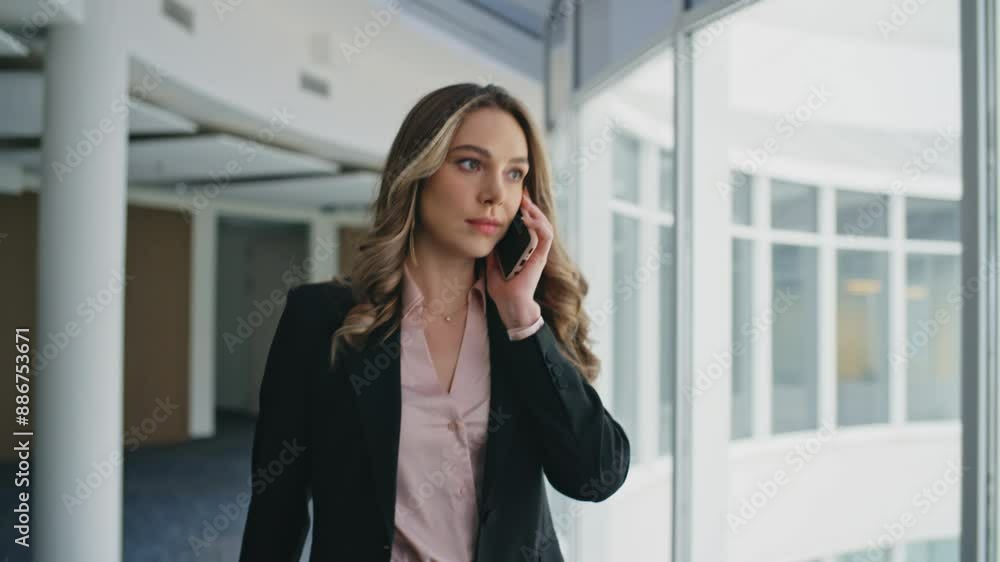 Corporate professional calling smartphone walking modern office hallway closeup. Corporate professional calling smartphone walking modern office hallway closeup.