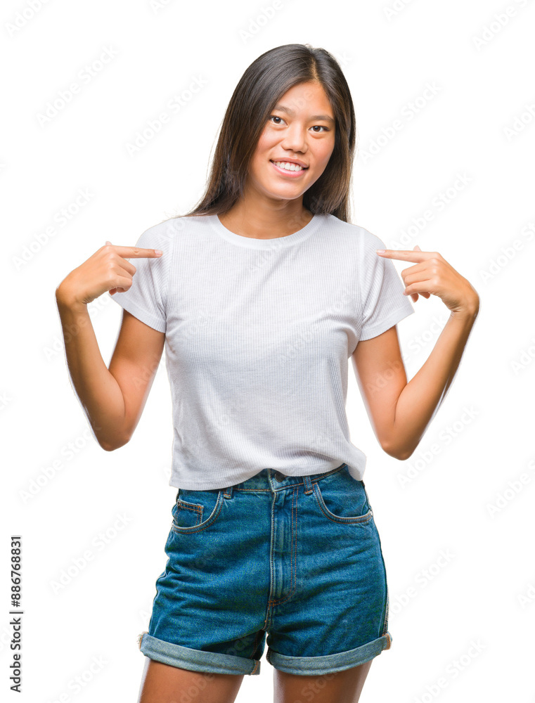 Young asian woman over isolated background looking confident with smile on face, pointing oneself with fingers proud and happy. Young asian woman over isolated background looking confident with smile on face, pointing oneself with fingers proud and happy.