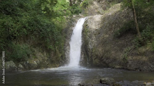Beautiful waterfall in tropical forest in Chae Son National Park, Lampang, Thailand
