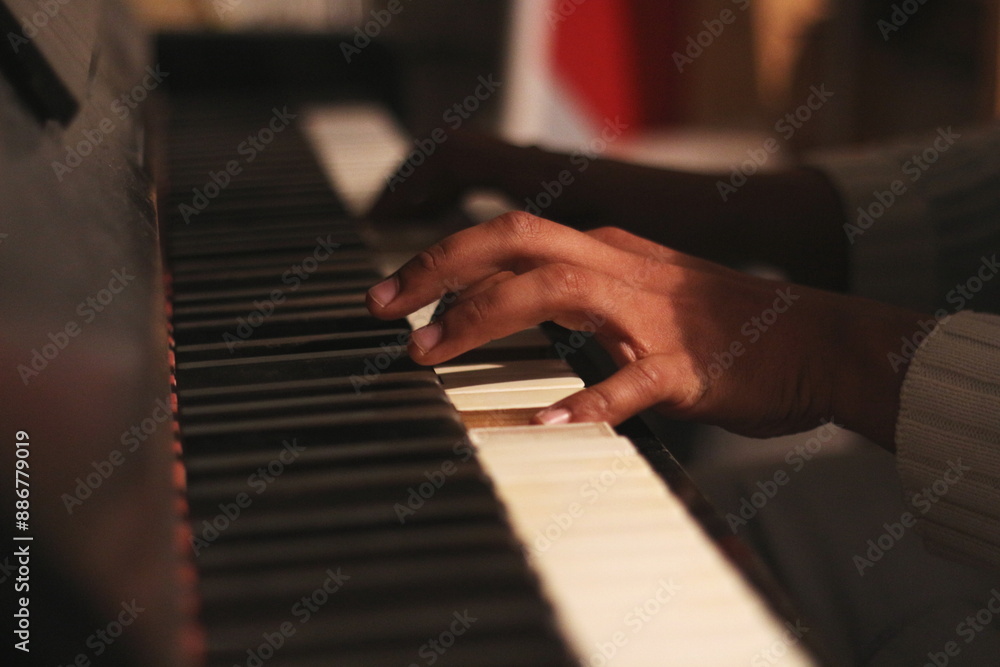 Fototapeta premium Creative Hands on Old Honky Tonk Piano: Wide Aperture Shot