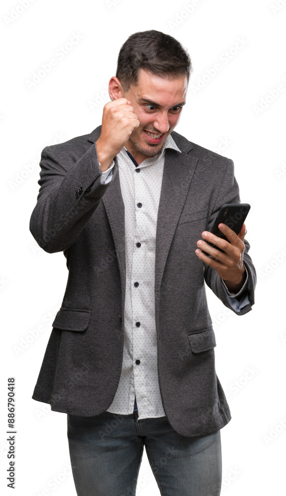 Handsome young man using smartphone annoyed and frustrated shouting with anger, crazy and yelling with raised hand, anger concept Handsome young man using smartphone annoyed and frustrated shouting with anger, crazy and yelling with raised hand, anger concept