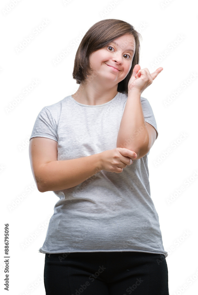 Young adult woman with down syndrome over isolated background with a big smile on face, pointing with hand and finger to the side looking at the camera. Young adult woman with down syndrome over isolated background with a big smile on face, pointing with hand and finger to the side looking at the camera.