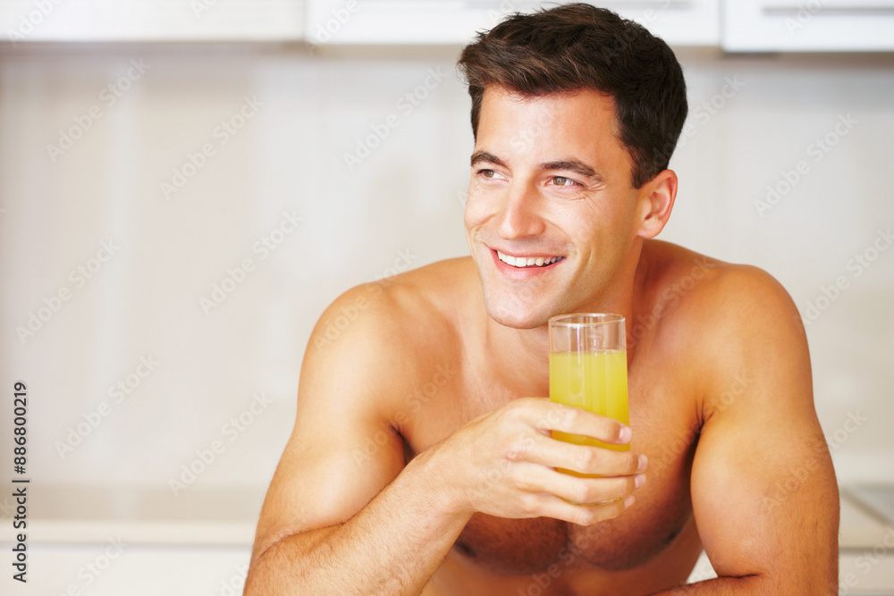 Happy man, smile and hold for juice in kitchen for delicious, nutrition and liquid breakfast for balanced diet. Male person, face and excited for fresh, organic and orange beverage for healthy drink Happy man, smile and hold for juice in kitchen for delicious, nutrition and liquid breakfast for balanced diet. Male person, face and excited for fresh, organic and orange beverage for healthy drink