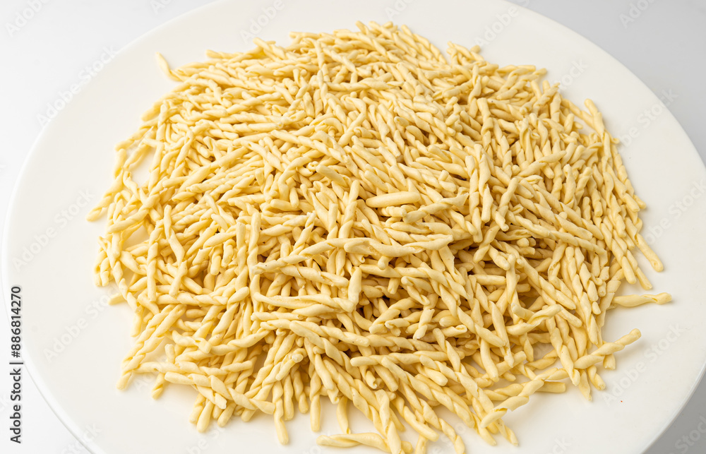 Raw Trofie Pasta, Dry Italian Macaroni, Traditional Genoa Food, Raw Noodle, Modern Ligurian Cuisine Raw Trofie Pasta, Dry Italian Macaroni, Traditional Genoa Food, Raw Noodle, Modern Ligurian Cuisine