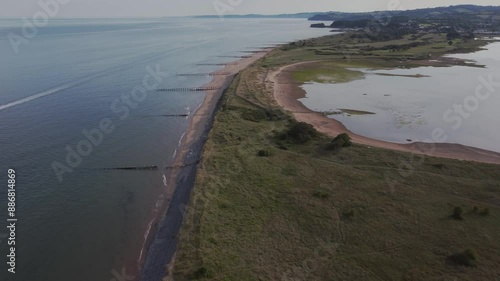 A drone view of the beach and dunes at Dawlish Warren, guarding the mouth of the River Exe, near Exmouth, Devon, England, United Kingdom, Europe photo