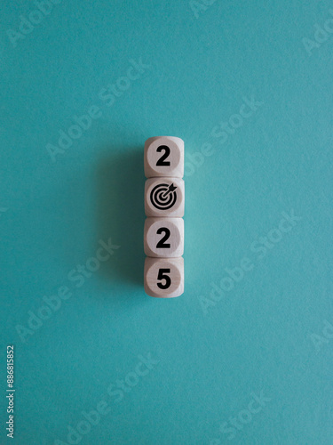 Obraz na płótnie 2025 Happy New year symbol. Numbers and target dart icon on white blocks stacked on blue background, vertical style. Welcome, Merry Christmas, and Happy New Year in 2025. w salonie