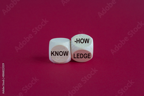 Obraz na płótnie To have know-how or to have knowledge Businessman turns a cube and changes the word know-how to knowledge. Beautiful pink background. w salonie