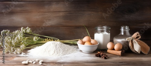 Rustic white wood with baking ingredients, like flour and egg yolks. Ideal for showcasing menus, recipes, or culinary classes with copy space image. photo