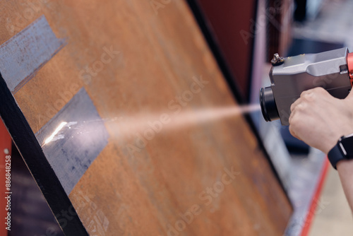 Fotografija Technology machine laser beam for remove rust from metal