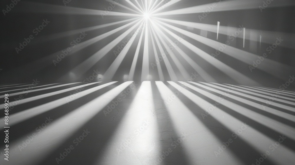 Black-and-white photo of Sun shining through room's shadows, illumination from ceiling Black-and-white photo of Sun shining through room's shadows, illumination from ceiling