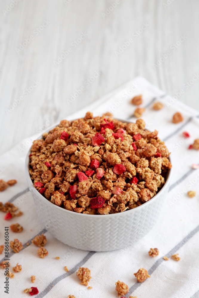 Healthy Homemade Granola with Strawberries in a Bowl, side view. Copy space. Healthy Homemade Granola with Strawberries in a Bowl, side view. Copy space.