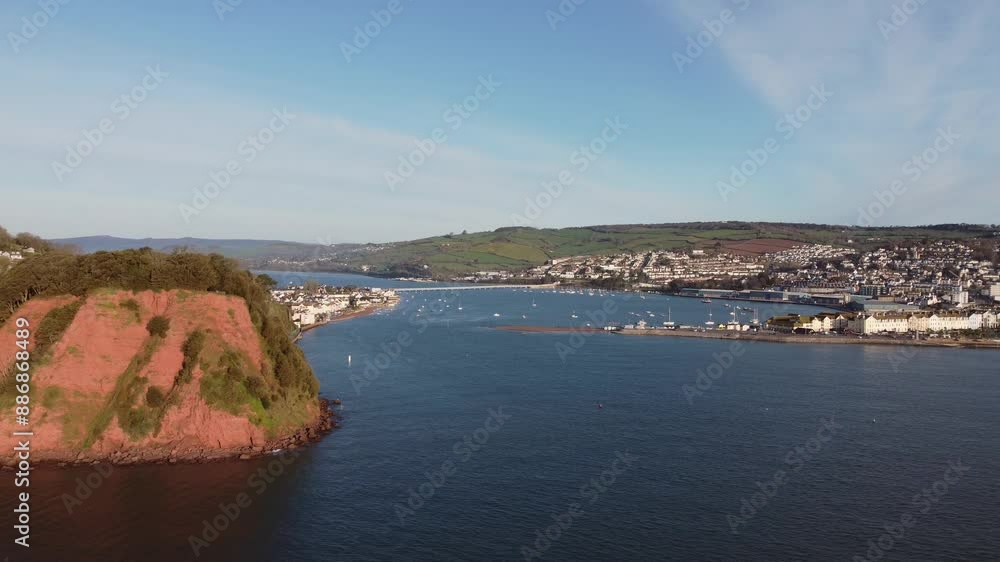 A drone view of the mouth of the River Teign, plus the seaside town of Teignmouth, Devon, England, United Kingdom, Europe A drone view of the mouth of the River Teign, plus the seaside town of Teignmouth, Devon, England, United Kingdom, Europe
