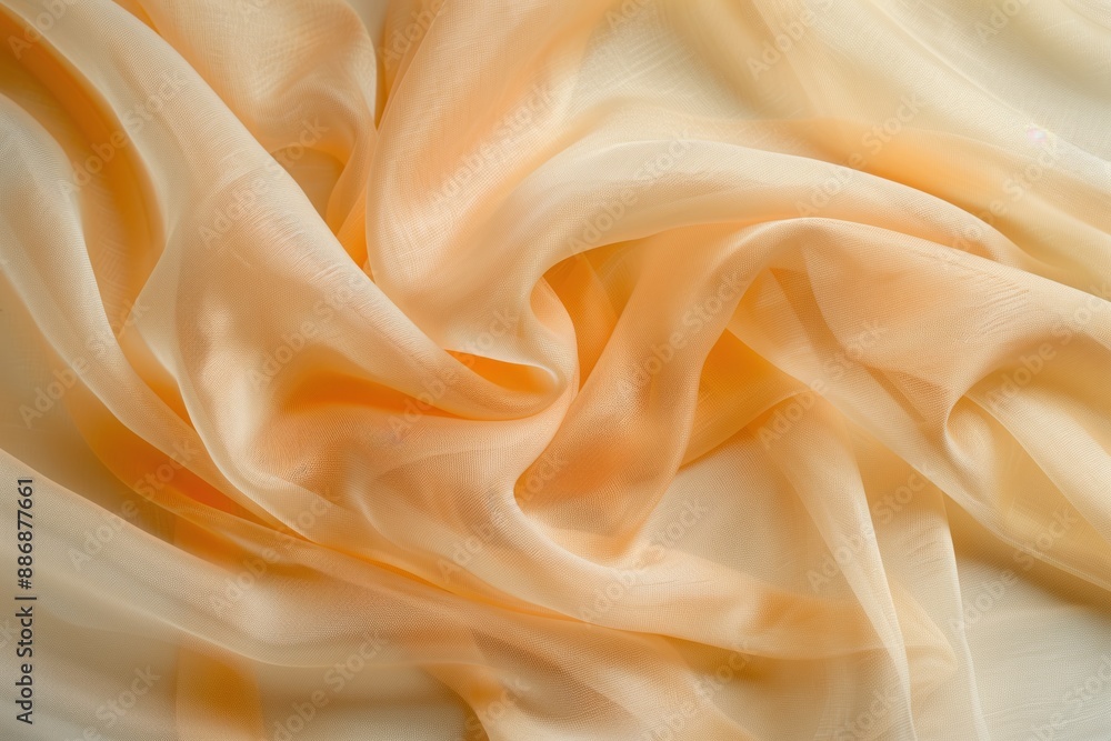 Orange fabric texture close-up. Smooth surface Organza cloth folded over itself creating depth dimension. Vibrant orange color stands out against blurred background. No text objects visible. Orange fabric texture close-up. Smooth surface Organza cloth folded over itself creating depth dimension. Vibrant orange color stands out against blurred background. No text objects visible.