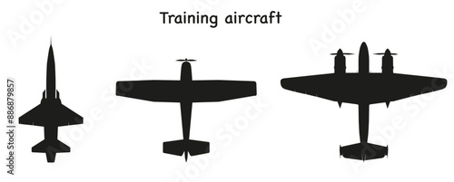 A set of American military training aircraft. Dark silhouettes. Vector graphics.