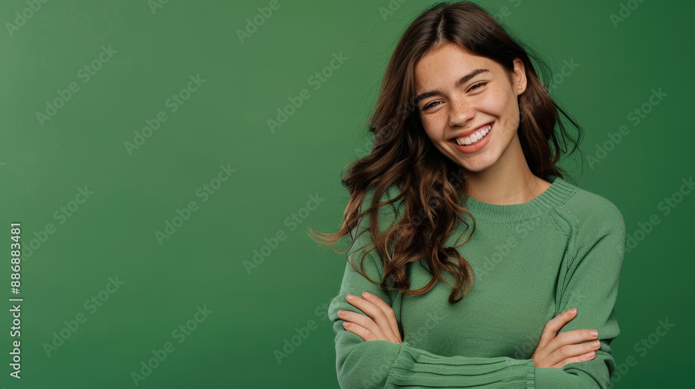 photo of smiling happy girl in front of green background photo of smiling happy girl in front of green background