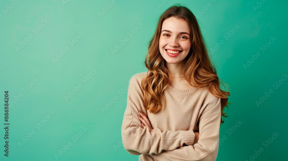 photo of smiling happy girl in front of green background photo of smiling happy girl in front of green background