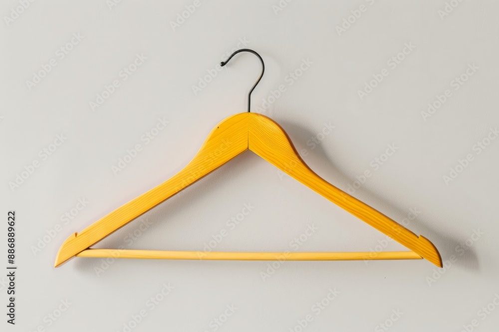 Trendy women's T-shirt hanger, white background, with copy space for fashion blogs, websites and social media posts