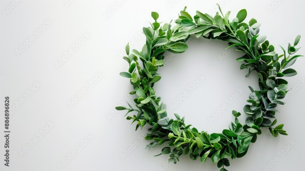Green wreath on white background with space for text Green wreath on white background with space for text