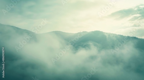 Morning mountain fog with soft focus blurred background and vintage touch