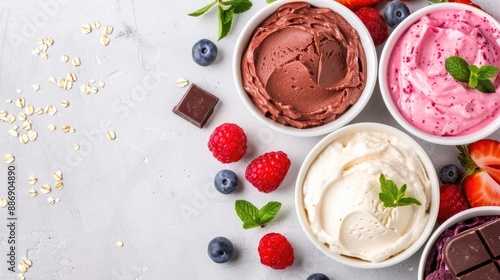 Wallpaper Mural Assorted flavors of ice cream in bowls with fresh berries and chocolate on a white background. Perfect for summer dessert and food presentations. Torontodigital.ca