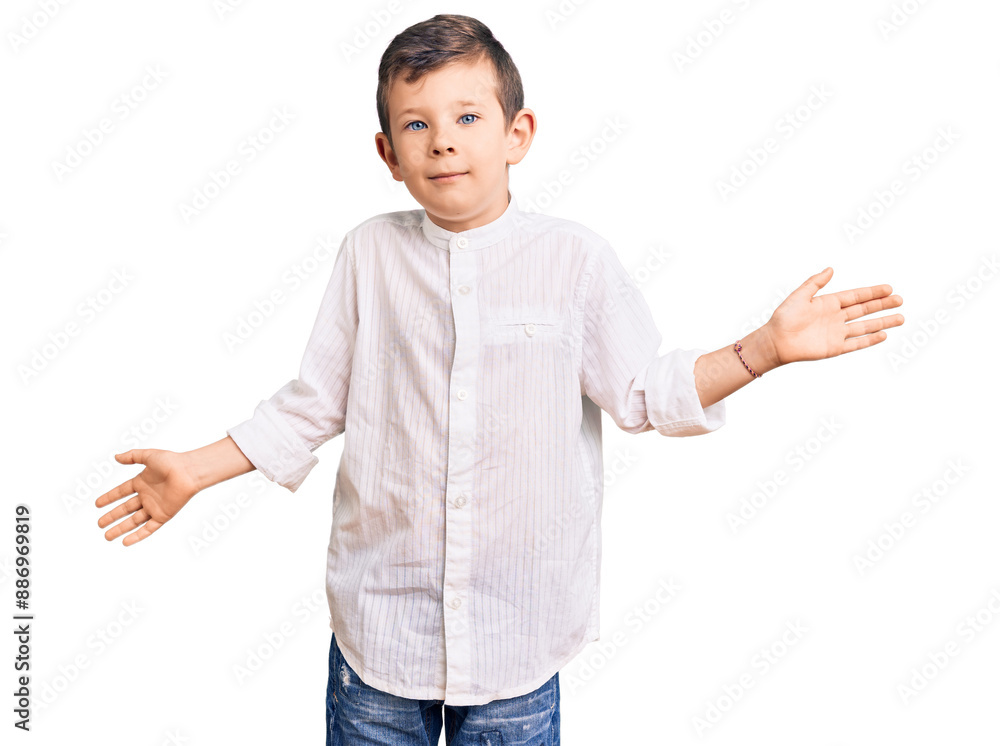 Cute blond kid wearing elegant shirt clueless and confused expression with arms and hands raised. doubt concept. Cute blond kid wearing elegant shirt clueless and confused expression with arms and hands raised. doubt concept.