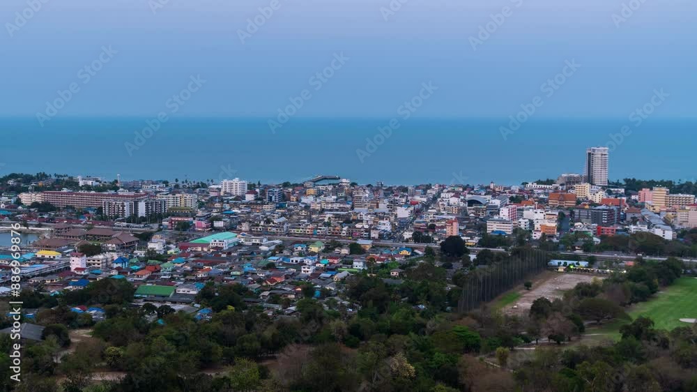 Day to night View of Hua Hin cityscape with illuminated buildings and coastal horizon, famous beach and tourist destination in Thailand – Time Lapse Day to night View of Hua Hin cityscape with illuminated buildings and coastal horizon, famous beach and tourist destination in Thailand – Time Lapse