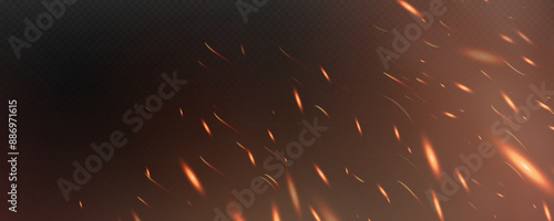 Burning hot sparks effect with embers burning ash and smoke flying in the air. Burning glowing particles. Flame of fire with sparks isolated on a black transparent background. Flame png.
