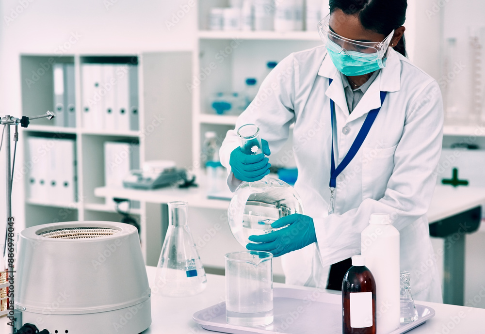 Fototapeta premium Scientist, woman and chemistry with beaker in lab with mask for experiment, research or vaccine analysis. Liquid, healthcare and medicine person for molecule structure, developing cure or innovation