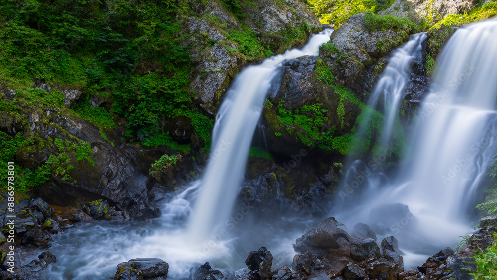 Fototapeta premium Multiple metaphysical natural deep green forest waterfalls landscape