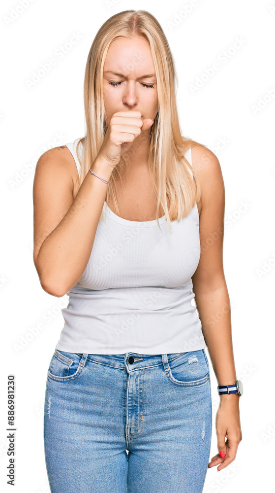 Young blonde girl wearing casual style with sleeveless shirt feeling unwell and coughing as symptom for cold or bronchitis. health care concept. Young blonde girl wearing casual style with sleeveless shirt feeling unwell and coughing as symptom for cold or bronchitis. health care concept.