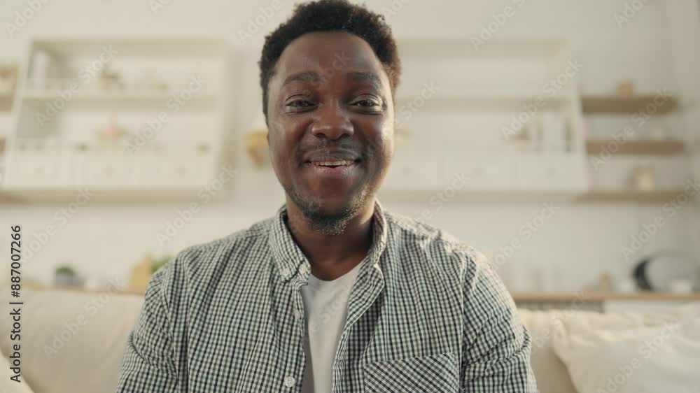 Happy African man streaming in social media, portrait of blogger in home studio. Video call and conference, online communication with friends, followers and colleagues, male student greeting everybody Happy African man streaming in social media, portrait of blogger in home studio. Video call and conference, online communication with friends, followers and colleagues, male student greeting everybody
