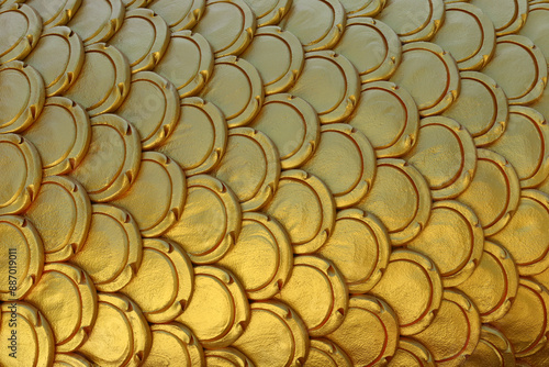 Wallpaper Mural Gold patterns of stucco shaped like fish scales. Torontodigital.ca