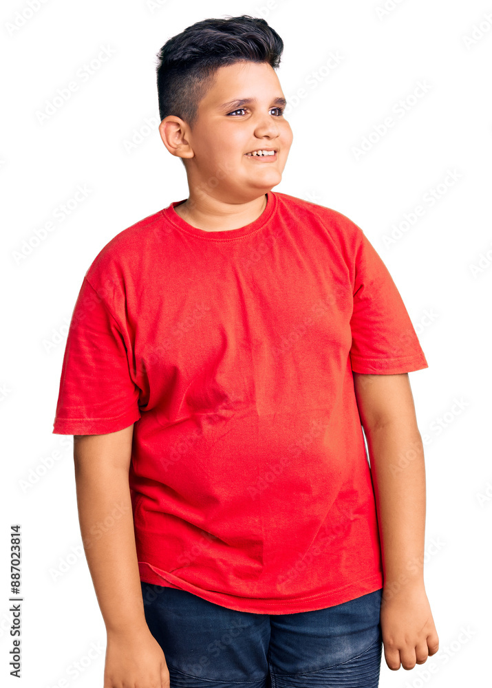 Little boy kid wearing casual clothes looking away to side with smile on face, natural expression. laughing confident. Little boy kid wearing casual clothes looking away to side with smile on face, natural expression. laughing confident.