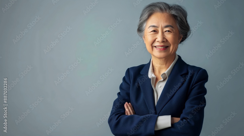Confident Elderly Southeast Asian Businesswoman in Professional Attire, Corporate Leadership, Senior Executive Portrait Confident Elderly Southeast Asian Businesswoman in Professional Attire, Corporate Leadership, Senior Executive Portrait