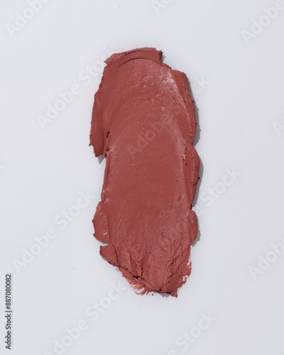 An elegant sample of a cosmetic swatch showcasing a rich shade and silky texture. Perfect for use in advertising campaigns, product catalogs, and sales presentations.
