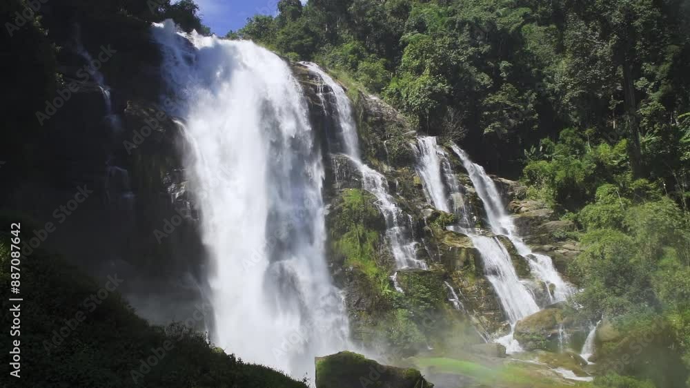 Majestic Wachirathan Waterfall in Doi Inthanon National Park, Chiang Mai, Thailand. A stunning natural attraction and famous tourist destination.- Slow Motion Majestic Wachirathan Waterfall in Doi Inthanon National Park, Chiang Mai, Thailand. A stunning natural attraction and famous tourist destination.- Slow Motion