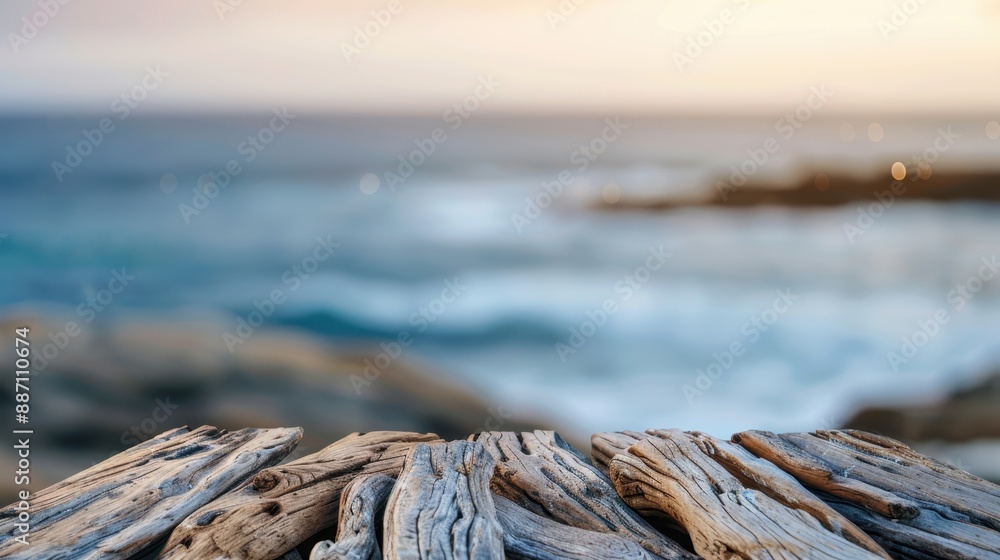 Close-up of weathered wooden planks with a blurred ocean background, perfect for nature-themed or summer-related design projects. Close-up of weathered wooden planks with a blurred ocean background, perfect for nature-themed or summer-related design projects.