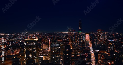 Wallpaper Mural Flying above the immense panorama of luminous New York. Dazzling scenery of the city at night. Torontodigital.ca