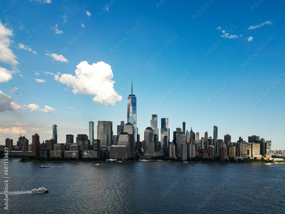 Obraz premium NYC aerial view. New York City skyline, cityscape of Manhattan in USA. New York City NYC Manhattan Downtown Skyline, viewed from Jersey City, New Jersey, USA.