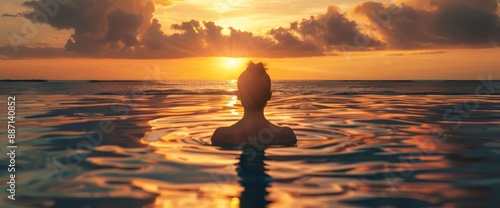 A Woman In An Infinity Pool At Sunset, Feeling Serene And Captivated By The View