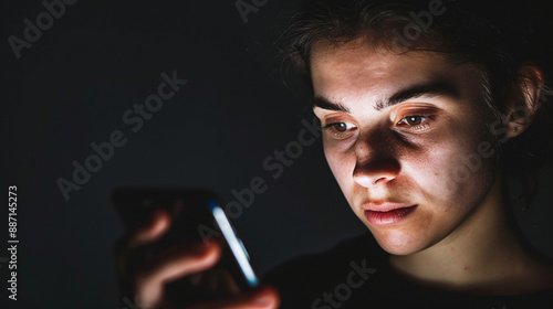 a young woman sitting in a dark room, scrolling through her phone, late-night social media scroll, screen addiction