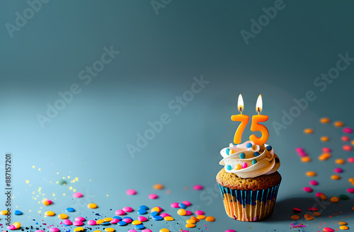 Birthday cupcake with number seventy-five candle