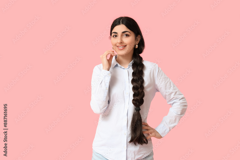 Beautiful young happy Indian woman on pink background Beautiful young happy Indian woman on pink background