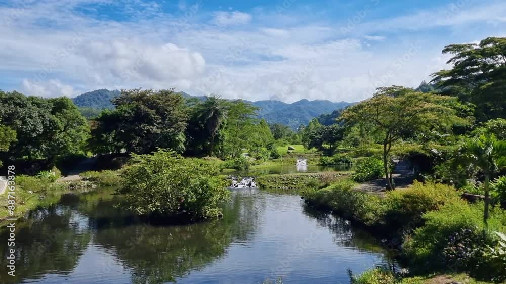 Panama, Boquete, lakes and waterfalls in the tropical vegetation of the park on a sunny day Panama, Boquete, lakes and waterfalls in the tropical vegetation of the park on a sunny day