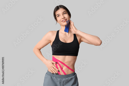 Young sporty woman with phy...