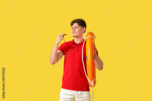 Male lifeguard with whistle...