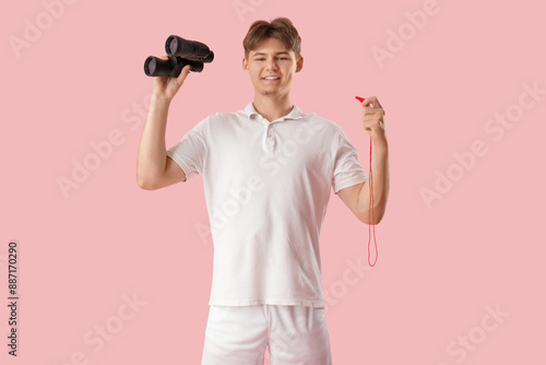 Male lifeguard with whistle...